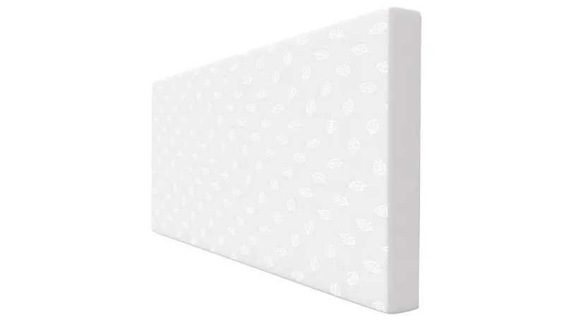 An image of a memory foam mattress set on its side