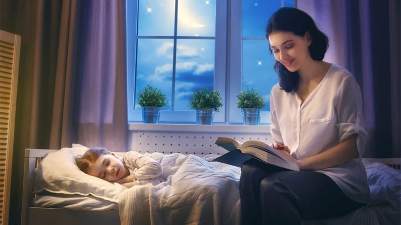 an image of a mother reading a bedtime story
