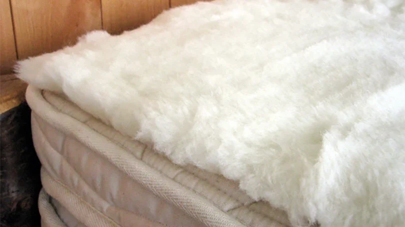 an image of lamb wool mattress topper