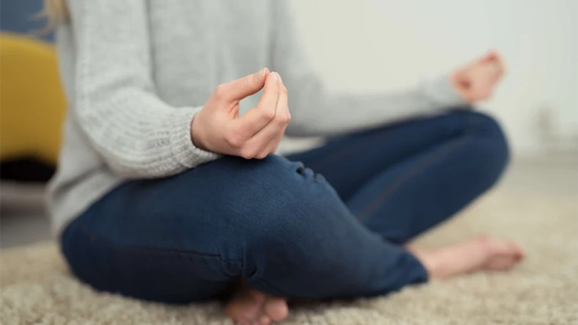 an image of a woman exercising yoga