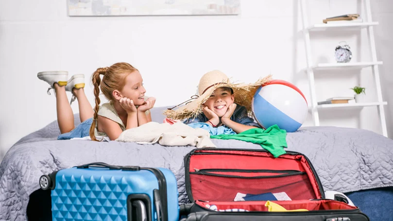 an image of kids preparing for a vacation