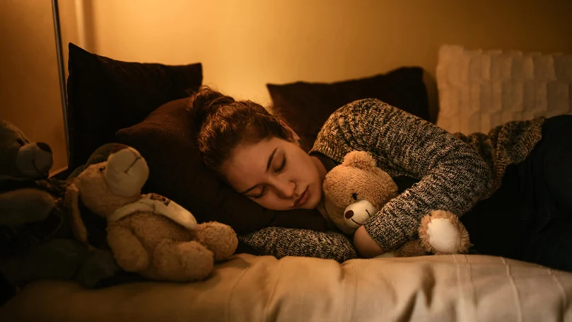 a woman sleeping during the winter time