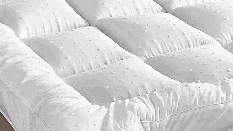 An image of Rejuvopedic new microfiber mattress topper top view.