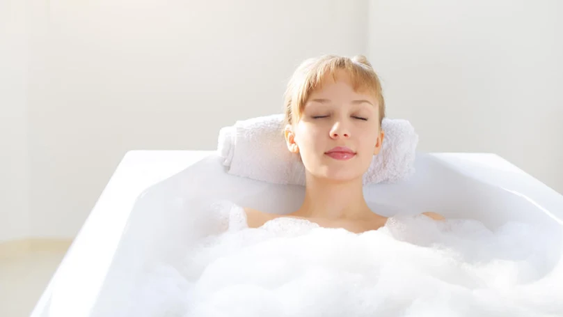 an image of a woman that enjoys a relaxing bath
