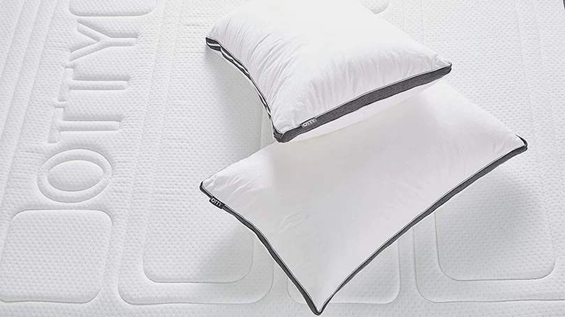 an image of otty adjustable pillow on an otty mattress