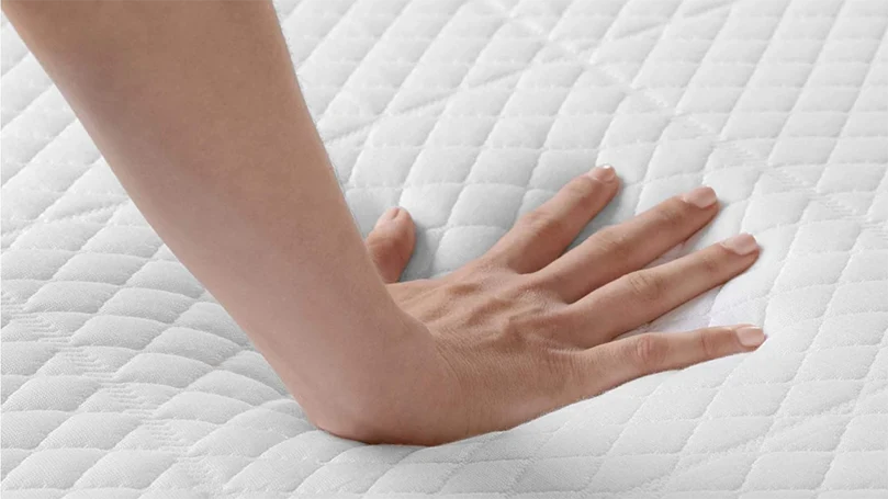 nectar sleep mattress pressed by a hand