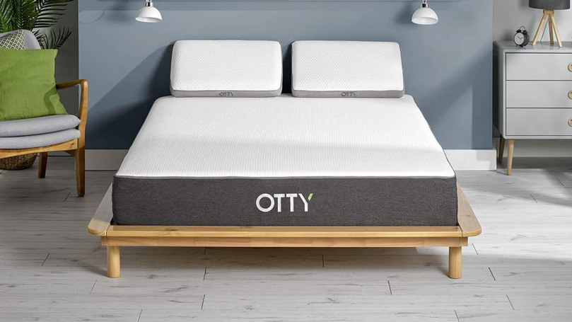 Otty hybrid mattress in a bedroom with two Otty pillows