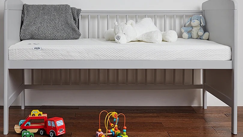 An image of Panda Kids Bamboo Cot mattress in a kid's room.