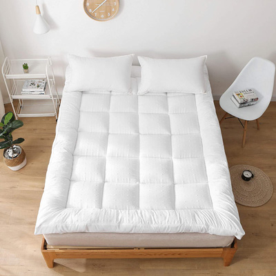 Product image of Rejuvopedic Double Bed Microfibre Mattress Protector on a bed
