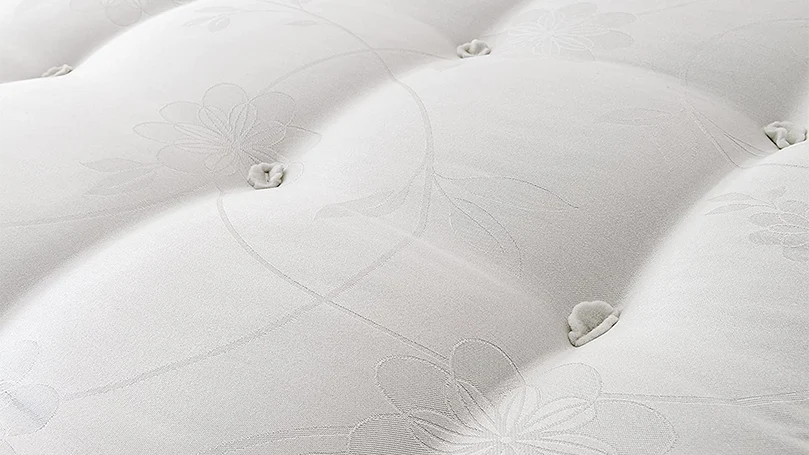 A close up photo of Silentnight's miracoil ortho mattress quilted hypoallergenic damask cover