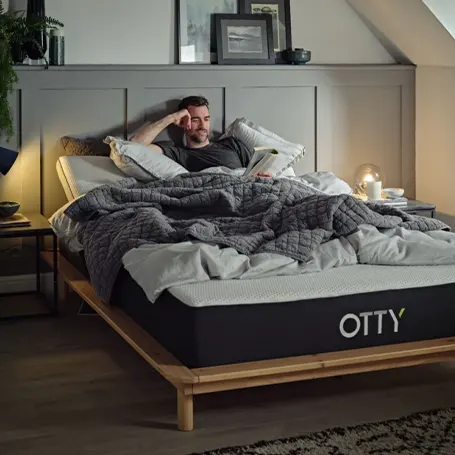 Man on OTTY Original Hybrid Mattress