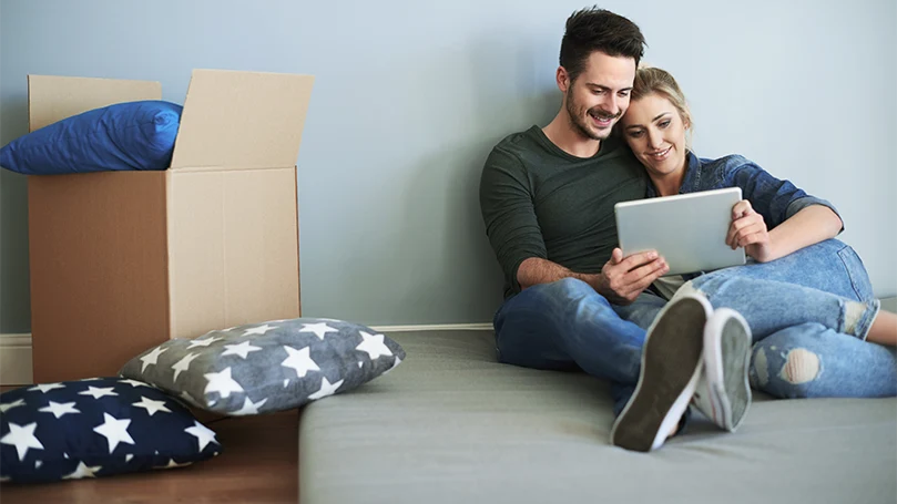 an image of a young couple having a mattress warranty