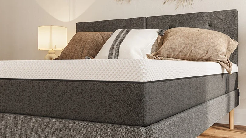 an image of emma premium hybrid mattress in a bedroom