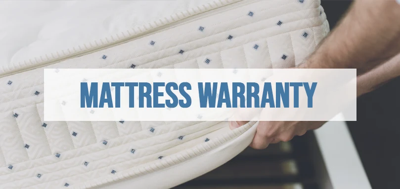 an image of a man checking for a mattress warranty
