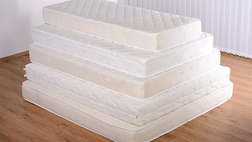 an image of several mattresses in a room