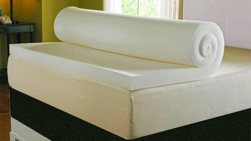 an image of visco therapy mattress topper on a bed