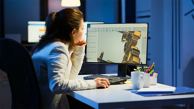 an image of a woman working on a pc before sleep