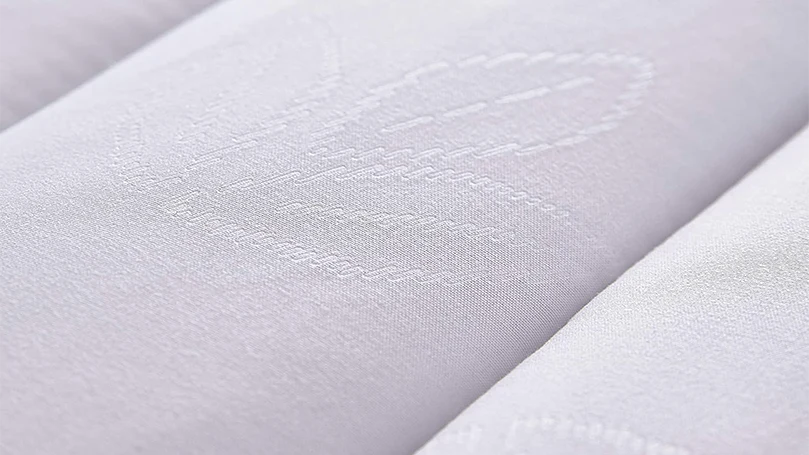a close up image of Silentnight Eco Comfort mattress topper