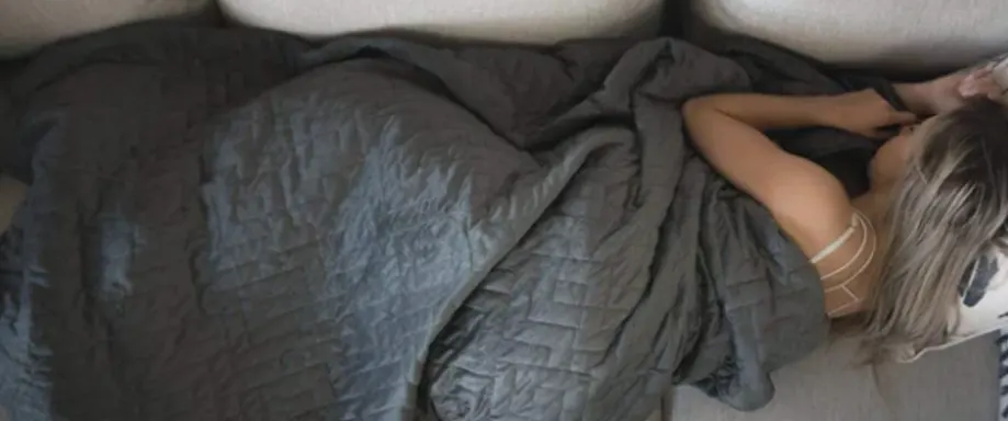 Woman sleeping with Adult Weighted Blanket
