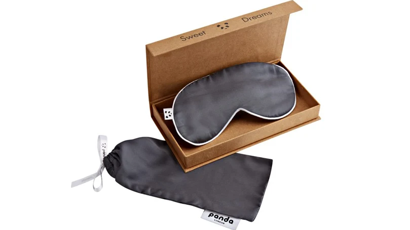 an image of black panda eye mask in a package