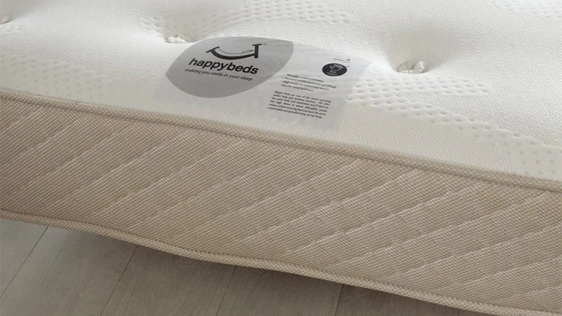 a close up image of happy beds clifton royale mattress