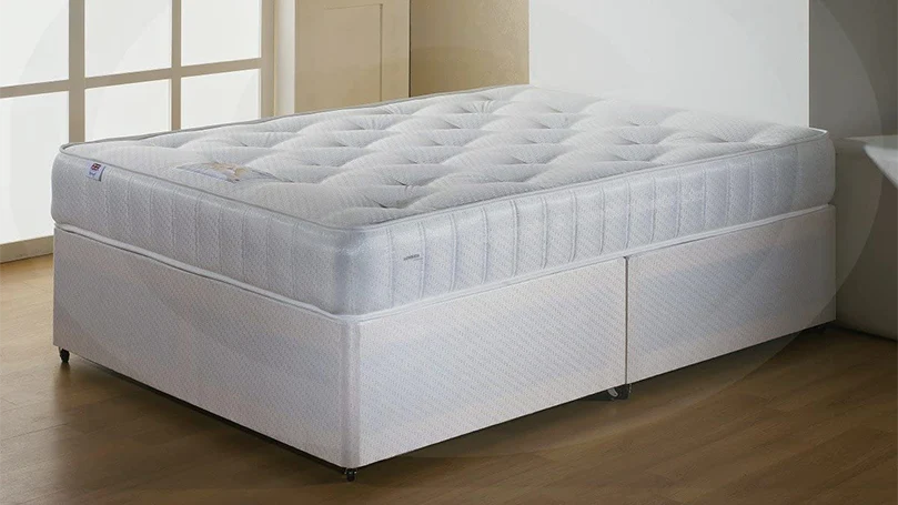an image of a divan bed base in a bedroom