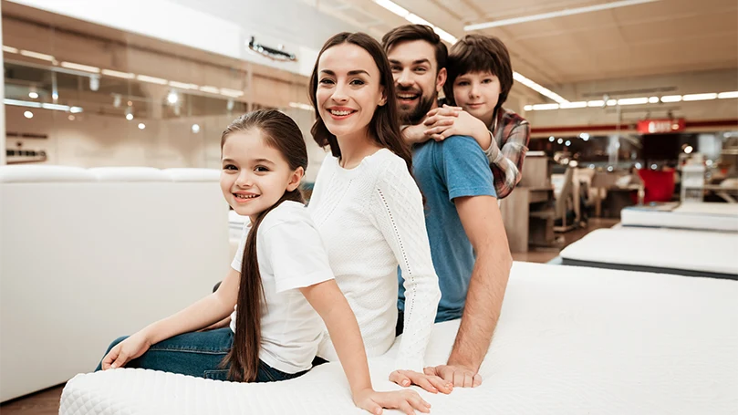 an image of a happy family found their perfect hybrid mattress