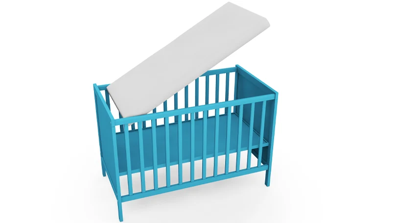 An image of a mattress in a cot bed.