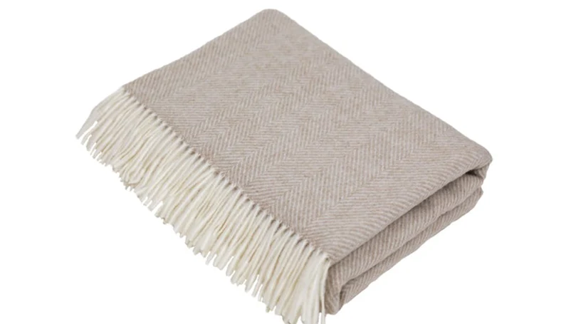 an image of scooms merino wool natural herringbone blanket