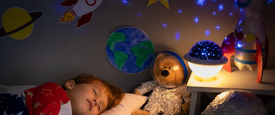 Kid sleeping with star night light on