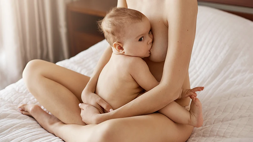 an image of a mom breastfeeding her baby