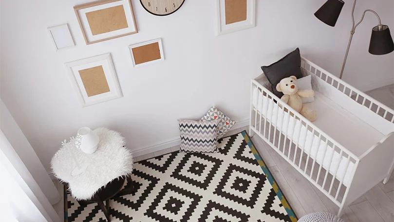 an image of a sleigh cot bed in a bedroom