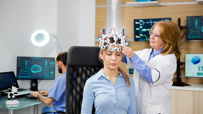 an image of a woman being prepared for a sleep test