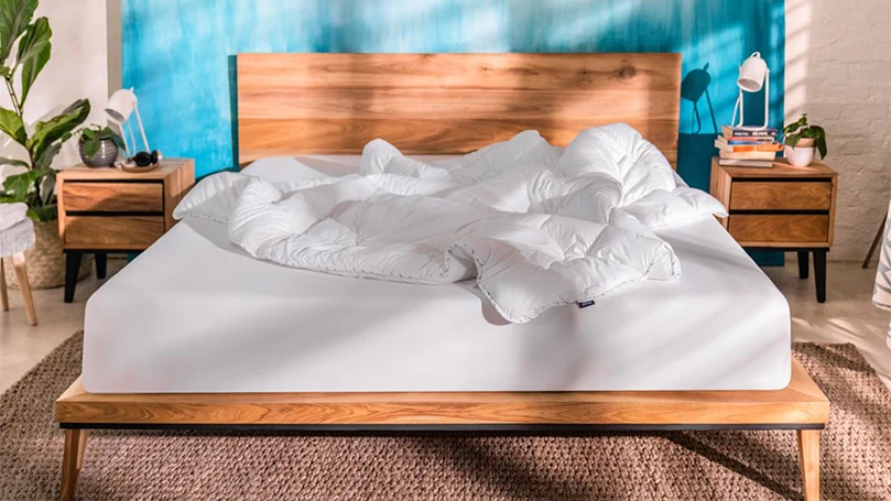 an image of emma cloud duvet on a bed in a bedroom