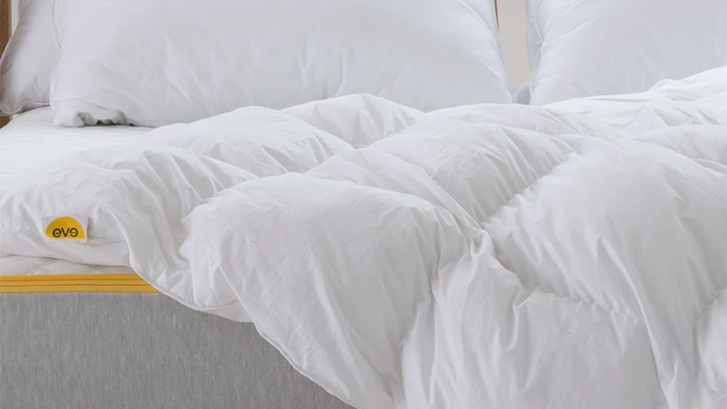 an image of eve snug duvet on a bed