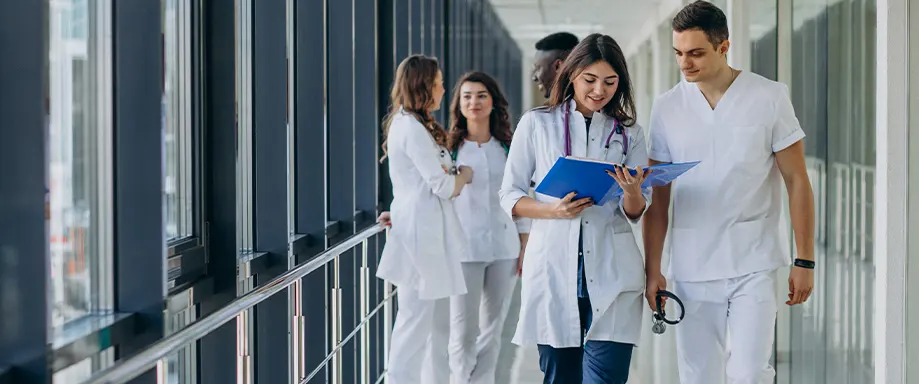 Doctors walking down a clinic hallway