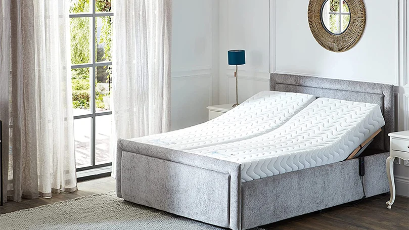 An image of Adjustable bed in a bedroom.