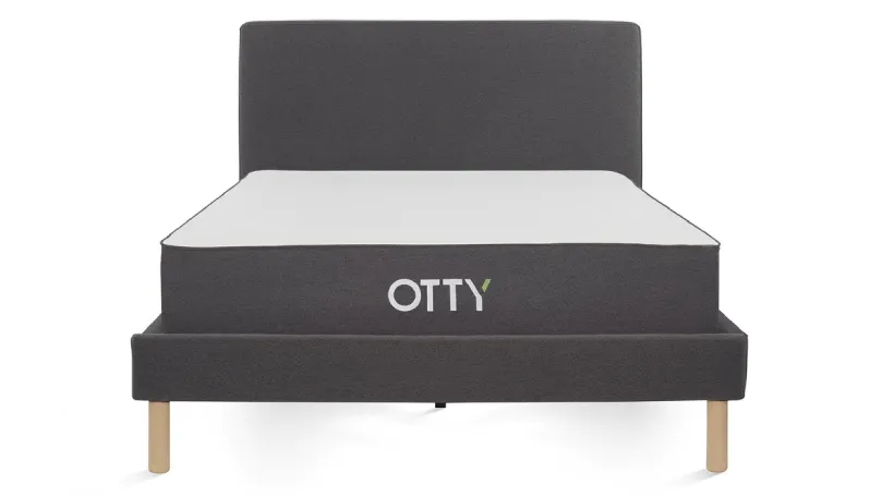A product image of OTTY bed frame that has an OTTY mattress on top of it