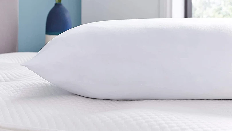 An image of Silentnight Anti Snore pillow on a bed.