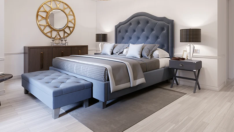 An image of upholstered bed in a bedroom.