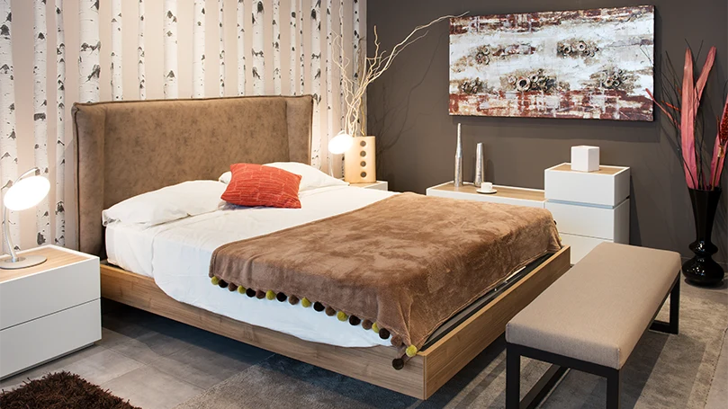 An image of a bed in a bedroom.