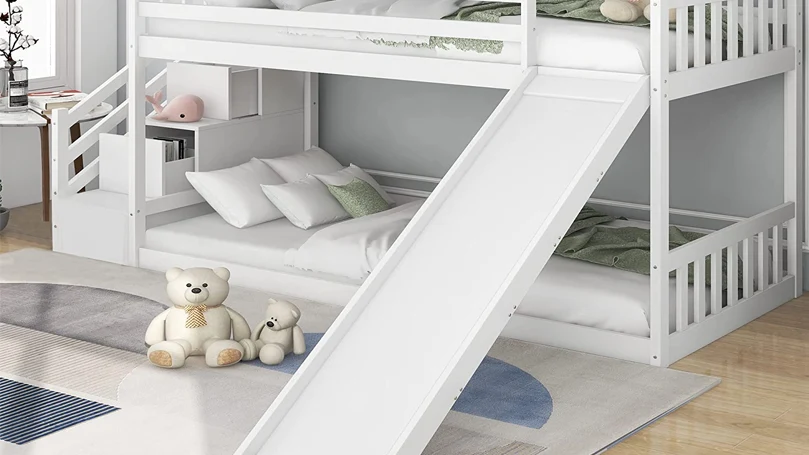 An image of a bunk bed with a slide