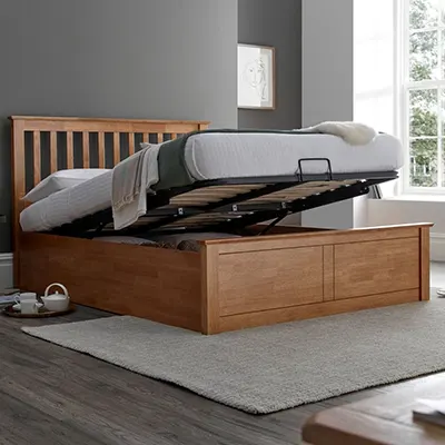 A product image of Malmo Oak Wooden Ottoman Bed HAPPY BEDS.