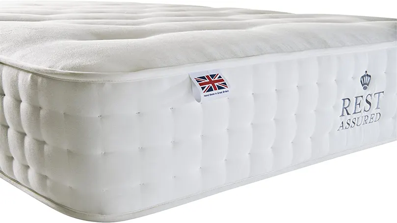 A close up image of Rest Assured 2000 Pocket Sprung mattress.