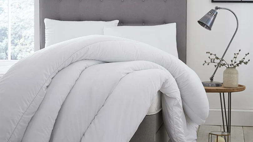 An image of Silentnight winter nights duvet on a bed.