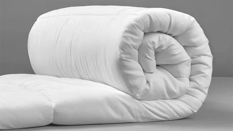 An image of Slumberdown Climate Control duvet rolled.