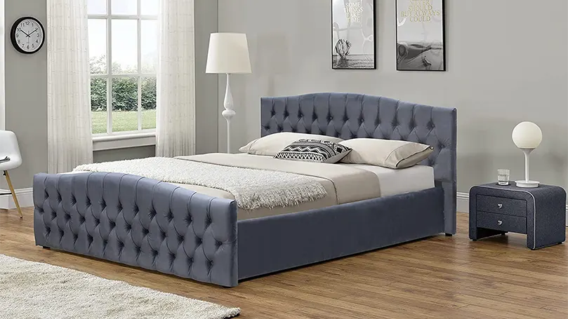 An image of a modern gray sleigh bed.