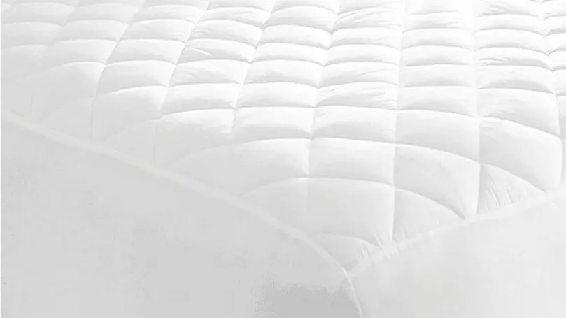 An image of a quilted mattress protector.