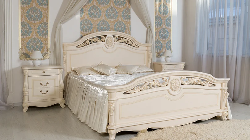 An image of gray sleigh bed.