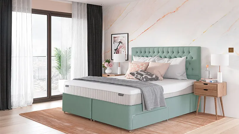 An image of Dunlopillo Orchid mattress in a bedroom.